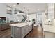 Bright, spacious kitchen with gray island, modern appliances and open floor plan at 10626 Bonne Chance Dr, Orlando, FL 32832