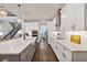 Bright, spacious kitchen with white cabinets and countertops, stainless steel appliances at 10626 Bonne Chance Dr, Orlando, FL 32832