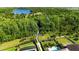 Picturesque walking trail with lush greenery and a serene lake at 10626 Bonne Chance Dr, Orlando, FL 32832