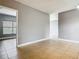 Spacious empty room with neutral walls, tile flooring, and natural light, perfect for customization at 107 Carlisle Ct, Kissimmee, FL 34758