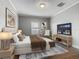 Serene bedroom featuring a cozy bed, soft lighting, and a television for relaxing evenings at 107 Carlisle Ct, Kissimmee, FL 34758