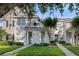 Charming two-story townhouse with manicured lawn and inviting walkway at 112 Southern Pecan Cir # 201, Winter Garden, FL 34787
