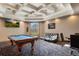 Spacious game room with a pool table, comfortable seating, and entertainment options for relaxation and fun at 112 Southern Pecan Cir # 201, Winter Garden, FL 34787