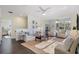 Spacious living room with an open layout, lots of light, and stylish décor at 112 Southern Pecan Cir # 201, Winter Garden, FL 34787