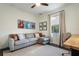 Inviting office area with comfortable seating, natural light, and stylish decor for a productive workspace at 112 Southern Pecan Cir # 201, Winter Garden, FL 34787