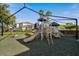 Community playground with slides, climbing structures, and a safe play area for children to enjoy at 112 Southern Pecan Cir # 201, Winter Garden, FL 34787