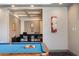 Recreation room featuring a pool table, computers, and stylish decor for leisure and entertainment at 112 Southern Pecan Cir # 201, Winter Garden, FL 34787