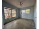 This bedroom offers natural light with a ceiling fan, providing a comfortable atmosphere at 122 Laurel Dr, Sanford, FL 32773