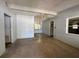 Living room features a ceiling fan, window, and open layout at 122 Laurel Dr, Sanford, FL 32773