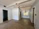 Living room features a ceiling fan, window, and open layout at 122 Laurel Dr, Sanford, FL 32773