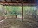 Rustic covered patio with an open view of the surrounding bamboo forest at 122 Laurel Dr, Sanford, FL 32773