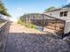 The home features a private screened-in pool area and a paved patio for outdoor relaxation at 1870 Vale Dr, Clermont, FL 34711