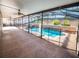 Screened in pool with connecting spa offers relaxation in a private outdoor setting at 1870 Vale Dr, Clermont, FL 34711