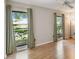 Bedroom featuring hardwood floors, neutral walls, and natural light at 194 Heron Bay Cir, Lake Mary, FL 32746