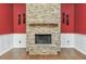 Close up view of a stone fireplace featuring a wood mantel and hearth at 194 Heron Bay Cir, Lake Mary, FL 32746