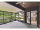 Enclosed patio providing an outdoor living space and access to the home's kitchen at 194 Heron Bay Cir, Lake Mary, FL 32746