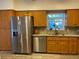 Spacious kitchen with stainless steel appliances, ample cabinet space and granite countertops at 19430 Sw 100Th Loop, Dunnellon, FL 34432