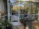 View from the screened-in pool looking into backyard at 19430 Sw 100Th Loop, Dunnellon, FL 34432