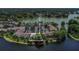 Aerial view of lakeside condos, highlighting location of property, parking, lake access and green area at 200 Maitland Ave # 153, Altamonte Springs, FL 32701