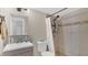 Clean bathroom featuring a walk-in shower and a light-colored vanity with contemporary fixtures at 200 Maitland Ave # 153, Altamonte Springs, FL 32701