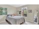 Cozy bedroom with soft lighting, a comfortable bed, and a picturesque view from the bright window at 200 Maitland Ave # 153, Altamonte Springs, FL 32701