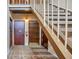 Hallway with stairwell, neutral colored tile, with access to multiple units on the floor at 200 Maitland Ave # 153, Altamonte Springs, FL 32701
