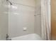 Bathroom shower featuring tile, shower curtain, and silver hardware at 2024 Linden Road, Winter Park, FL 32792