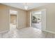 Dining area with tile flooring, adjacent to the kitchen and featuring an open view of the screened-in porch at 2024 Linden Road, Winter Park, FL 32792