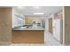 Bright kitchen with light wood cabinets and modern appliances, perfect for culinary enthusiasts at 2024 Linden Road, Winter Park, FL 32792