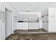Laundry area featuring washer, dryer, and gray cabinets at 2024 Linden Road, Winter Park, FL 32792