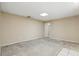 Spacious living area features neutral walls and carpet flooring, awaiting your personal touch at 2024 Linden Road, Winter Park, FL 32792
