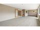 Spacious sunroom with hardwood floors and bar access at 2024 Linden Road, Winter Park, FL 32792