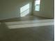 Bedroom with tile floors, white walls, baseboard trim, one window, and natural light at 2737 Monticello Way, Kissimmee, FL 34741