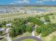 Aerial view with defined property lines, set within a lush landscape near a neighborhood at 2810 Windsong Ln, St Cloud, FL 34772