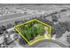 Aerial view showing property boundaries amid lush greenery near new residential development at 2810 Windsong Ln, St Cloud, FL 34772