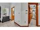 Bedroom with hardwood trim, doorway to bathroom and walk-in closet; bright natural light at 2810 Windsong Ln, St Cloud, FL 34772