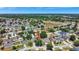 Aerial view highlighting a neighborhood with mature landscaping and well-maintained homes at 2848 Wilshire Rd, Clermont, FL 34714