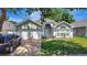 Charming single-Gathering home with well-manicured lawn and a two-car garage at 2848 Wilshire Rd, Clermont, FL 34714
