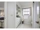 Bright bathroom with ample counter space, tiled floors, and decorative accents at 3306 Fishermans Cv, Winter Park, FL 32792