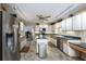 Spacious kitchen with modern stainless steel appliances and ample counter space at 3306 Fishermans Cv, Winter Park, FL 32792