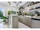 Wet bar area with granite countertop, cabinetry, and a view of the pool at 3306 Fishermans Cv, Winter Park, FL 32792