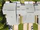 Aerial view of the roof showing driveway, lawn, and the home's position on the street at 35 Misners Trl, Ormond Beach, FL 32174