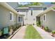 Charming home exteriors with sidewalk leading to the front door at 35 Misners Trl, Ormond Beach, FL 32174
