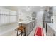 Modern kitchen features stone countertops, stainless appliances, and breakfast bar at 35 Misners Trl, Ormond Beach, FL 32174