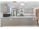 Spacious kitchen with stainless steel appliances, granite countertops, and ample cabinet space at 35 Misners Trl, Ormond Beach, FL 32174