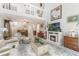 Spacious living room featuring high ceilings, fireplace, neutral colors and an open layout at 35 Misners Trl, Ormond Beach, FL 32174