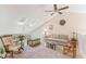 Bright loft area with skylights, vaulted ceilings, comfortable seating, and peaceful decor at 35 Misners Trl, Ormond Beach, FL 32174