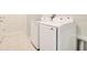 Laundry room featuring a side-by-side washer and dryer at 3761 Shoveler Ave, Leesburg, FL 34748