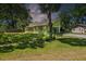 Charming single Gathering home, featuring a large lawn and attached garage at 3790 Ne 22Nd Ave, Ocala, FL 34479