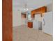 Spacious kitchen featuring wood cabinets, tile floors and standard appliances at 3790 Ne 22Nd Ave, Ocala, FL 34479